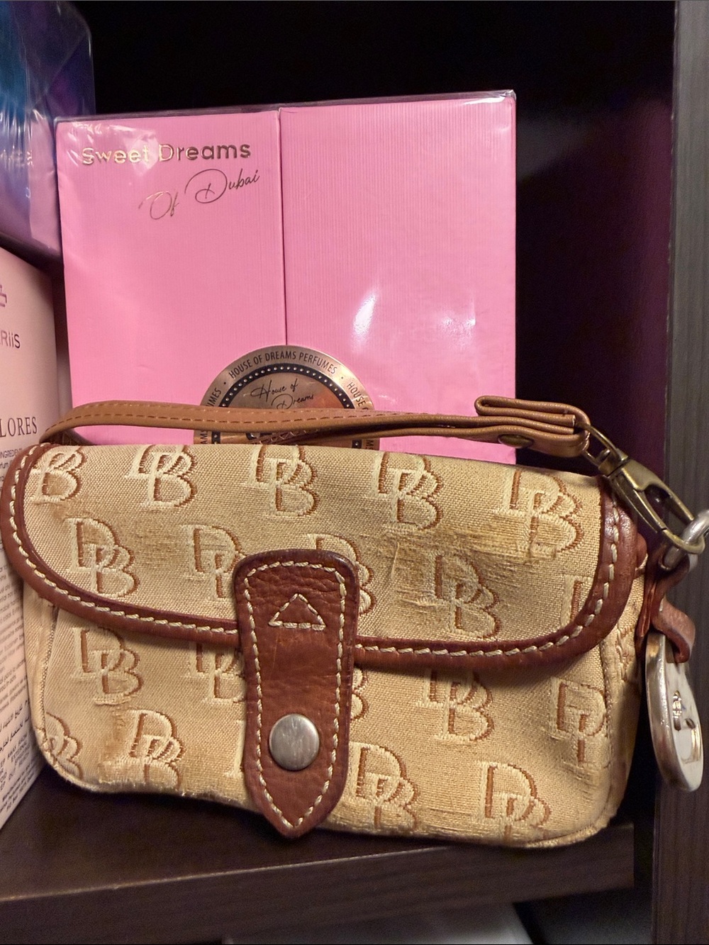 Dooney & Bourke Beige Monogram Canvas Wristlet with Brown Trim